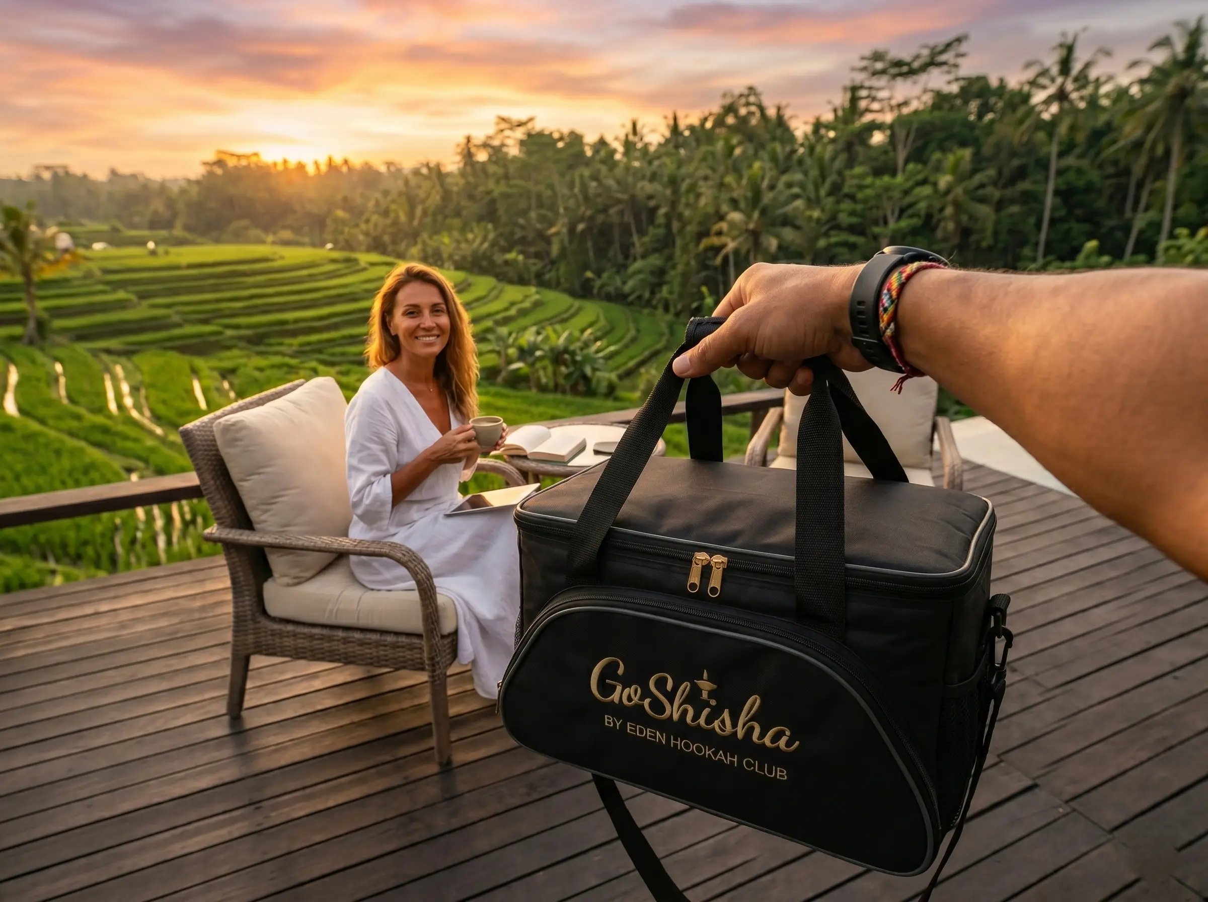 A beautiful sunset view overlooking Bali rice terraces as a woman receives her premium GoShisha delivery bag for an effortless hookah bali experience.