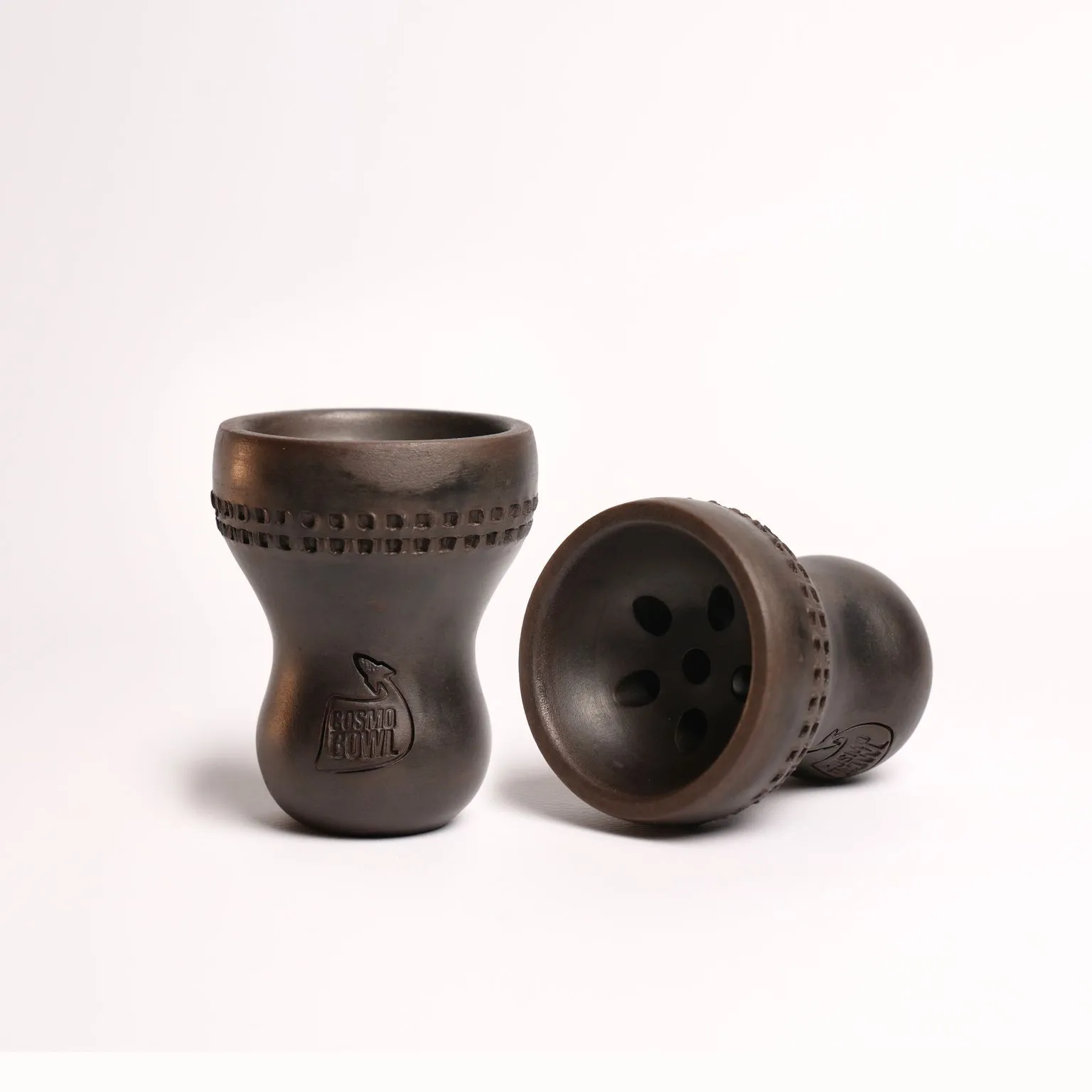 A dark clay Cosmo Bowl featuring the traditional Turkish design with large bottom holes. This is one of the most reliable hookah bowl types for an even, everyday smoke with both blonde and dark leaf tobaccos.